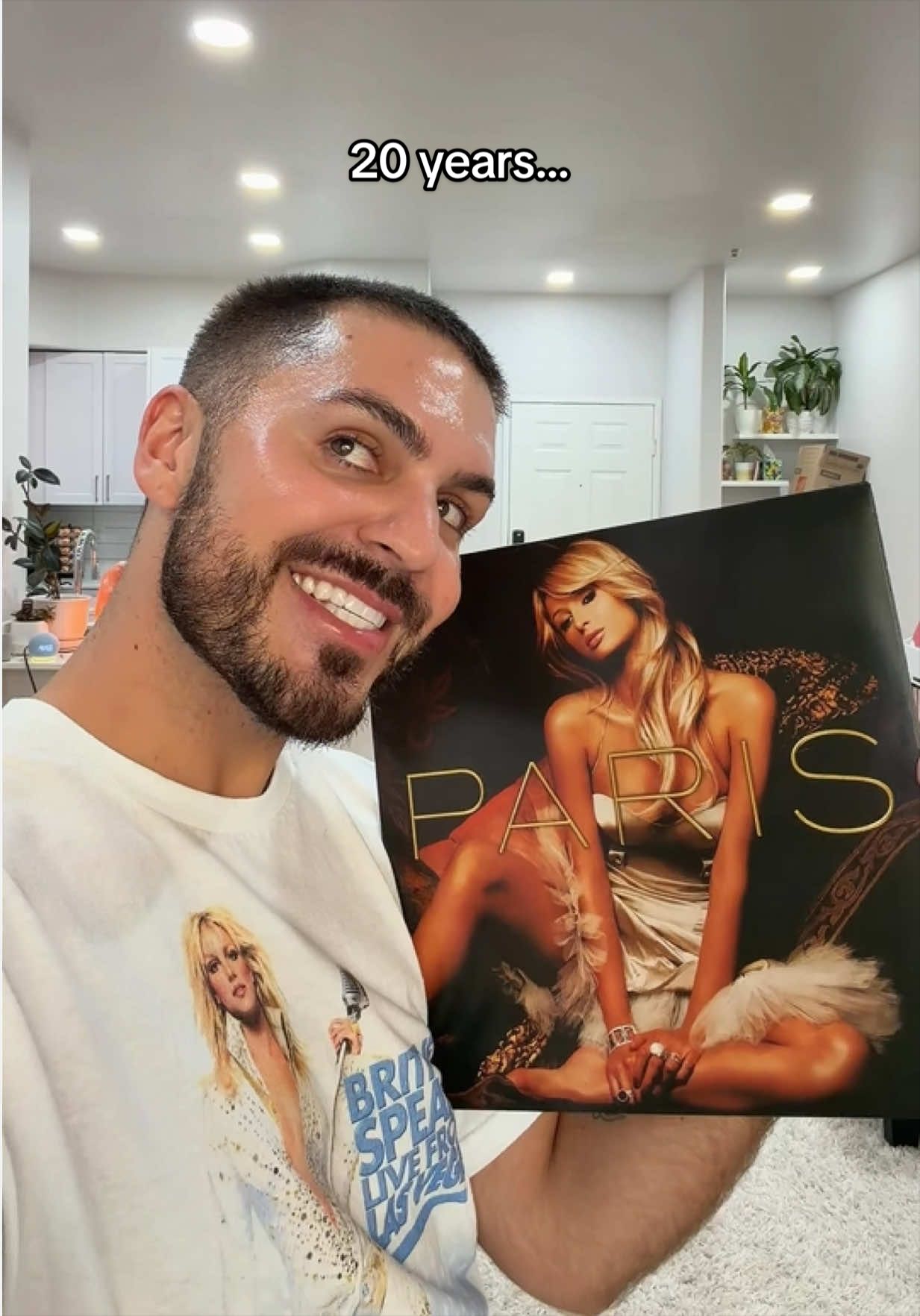 tyler holding paris hilton's debut album on vinyl